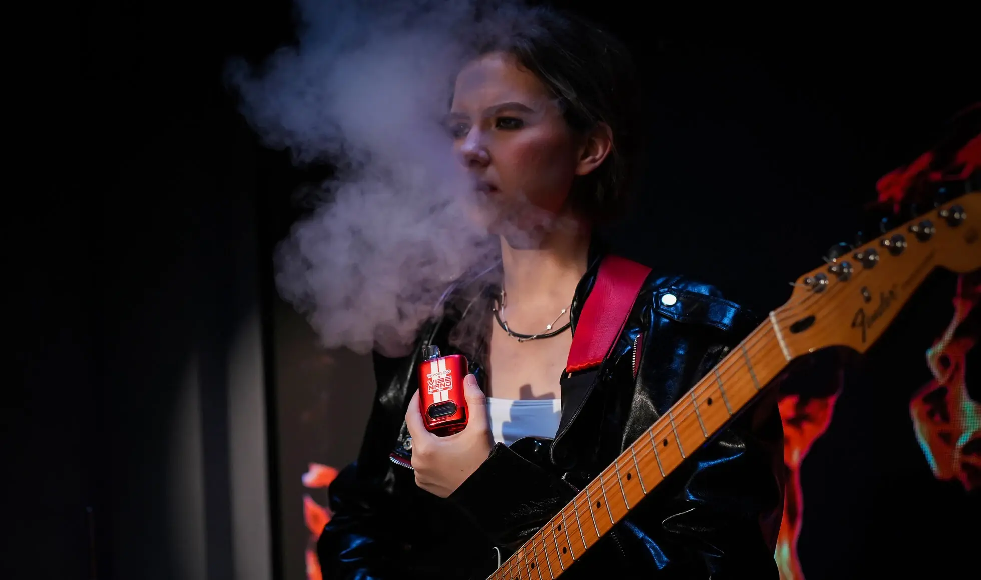 A musician using the VAPORESSO VIBE starter vape kit, demonstrating the instant absorption of its HyperFlow tech for a great flavor vape experience.